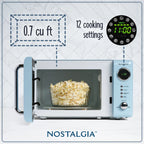 Nostalgia Retro Compact Countertop Microwave Oven 0.7 Cu. Ft. 700-Watts Orange