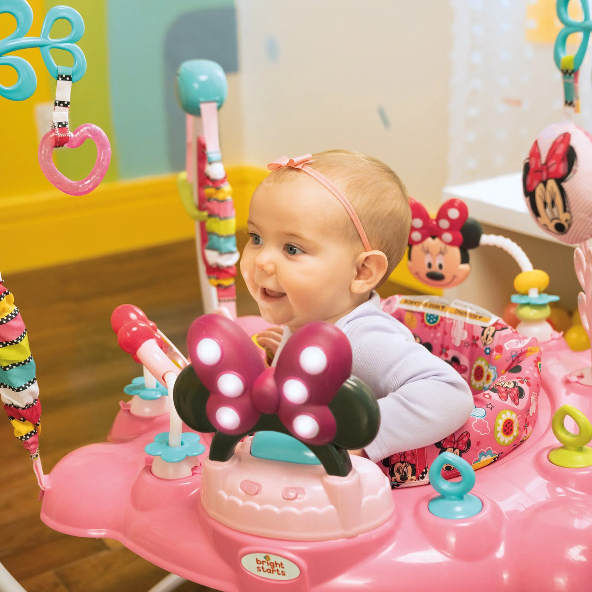Bright Starts Disney Baby Minnie Mouse PeekABoo Activity Jumper Bouncer With Lights & Music - 10299