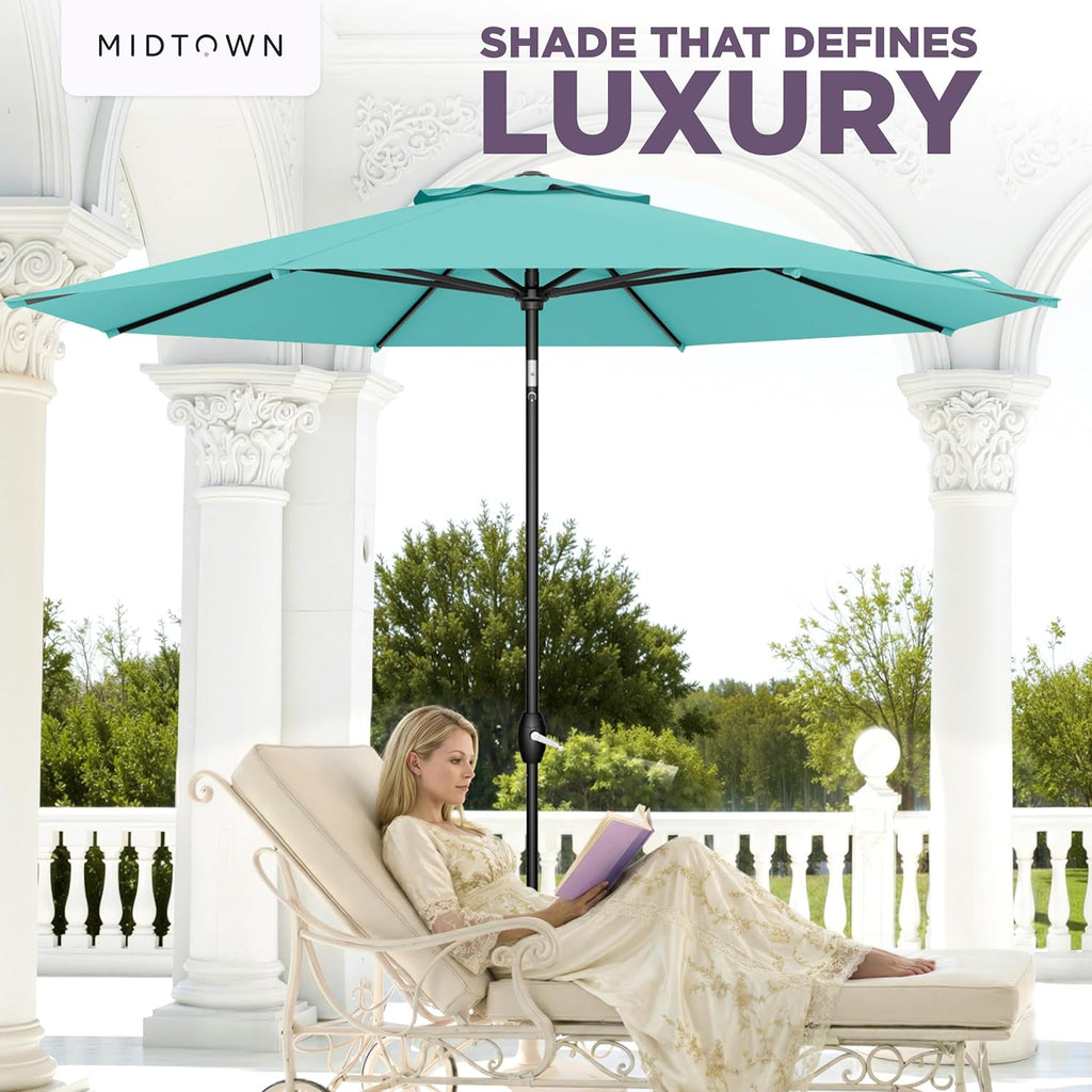 Midtown Umbrellas 9 Ft Patio Umbrella With Sunbrella Fabric, Aruba Canopy, Black Pole, Aluminum Frame And 8 Reinforced Ribs - The Lean